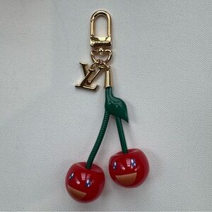 Brand new LUXE designer key chain, bag charm cerise cherry $100